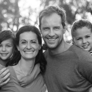 Smiling happy family of varied ages