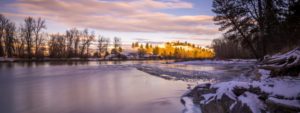 Frozen mountain river in the winter