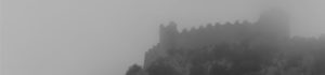 old building in the fog