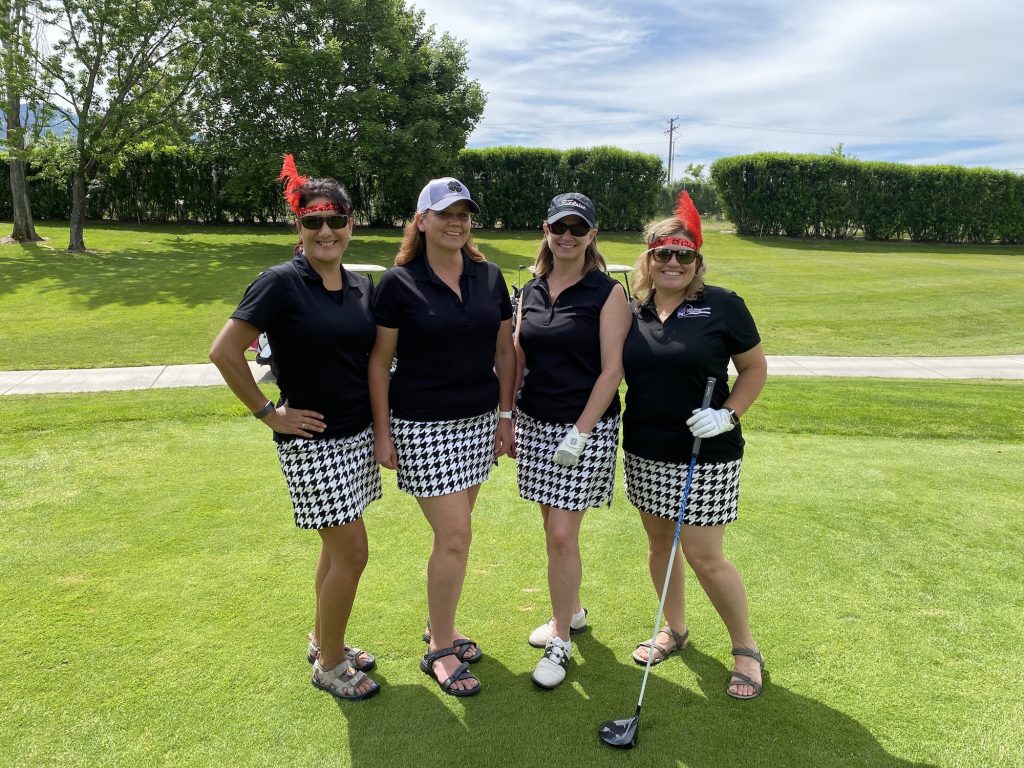One of our golfing teams for the day, and also Missoula Area Chamber of Commerce Red Coats. Ladies pictured include Julissa Bencia of Hensel of Missoula Job Service, Jeannine Lovell of First Interstate Bank, Becky Poitras of First American Title, and Denise Sherman, owner of Case Management Caregiving - Worden Thane Sponsors Red Ripper Golf Tournament