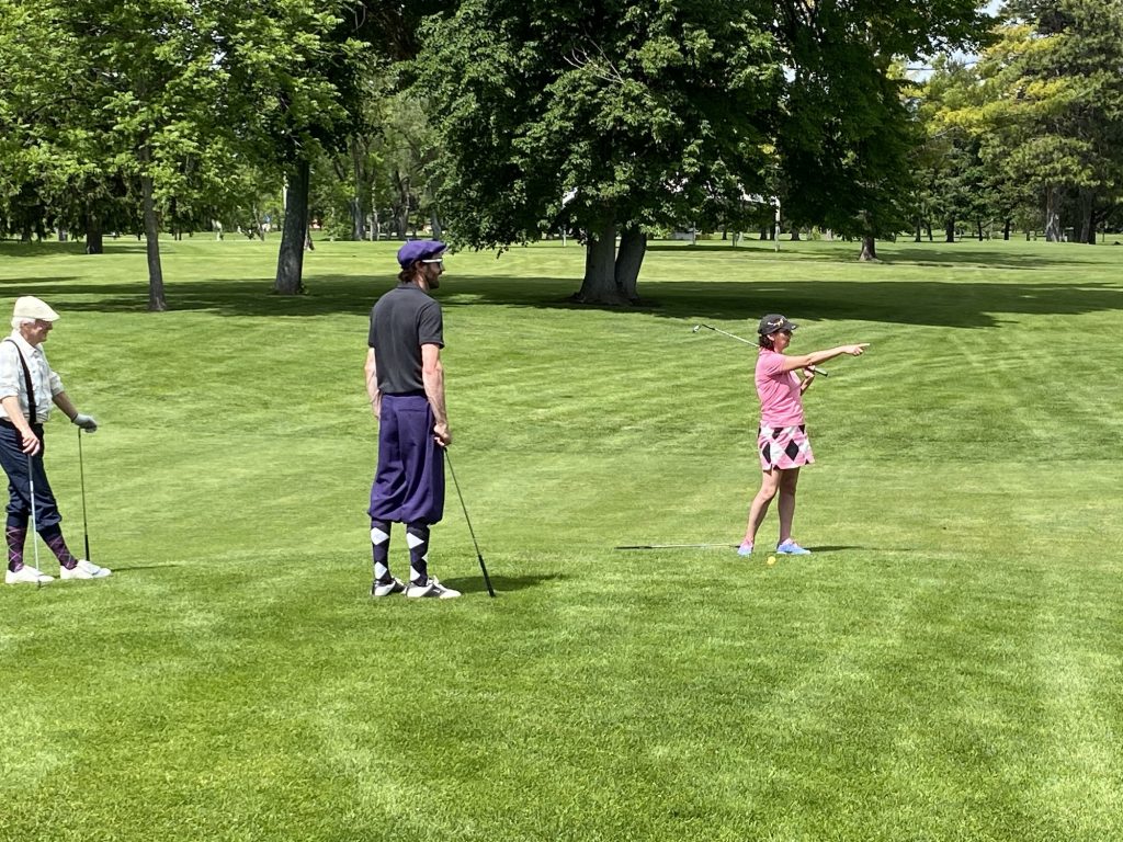 Seeley Lake Golfers from Clearwater Montana Properties, keeping their eye on the ball. Also winners of our Best Dressed contest - Worden Thane Sponsors Red Ripper Golf Tournament