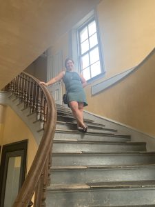 Person on staircase in historic Montana building