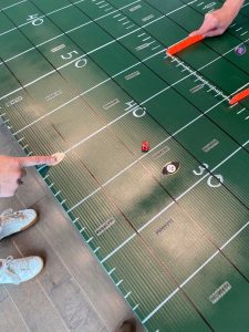 A close up of our really cool game board designed by Abby Dussault